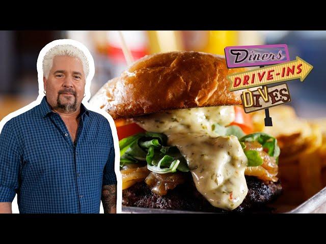 Guy Fieri Eats a Churrasco Steak Burger | Diners, Drive-Ins and Dives | Food Network