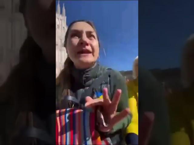 Russian woman harrassed by Ukraine supporters in Milan