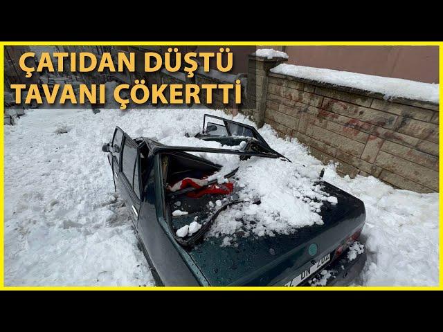 Arnavutköy'de Çatıdan Düşen Kar Kütlesi Otomobilin Tavanını Çökertti