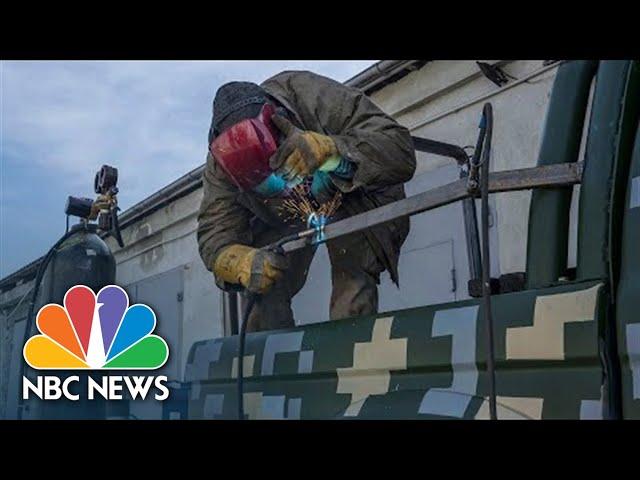 Watch: Volunteers Modify Truck With Armor For Military Use In Lviv, Ukraine