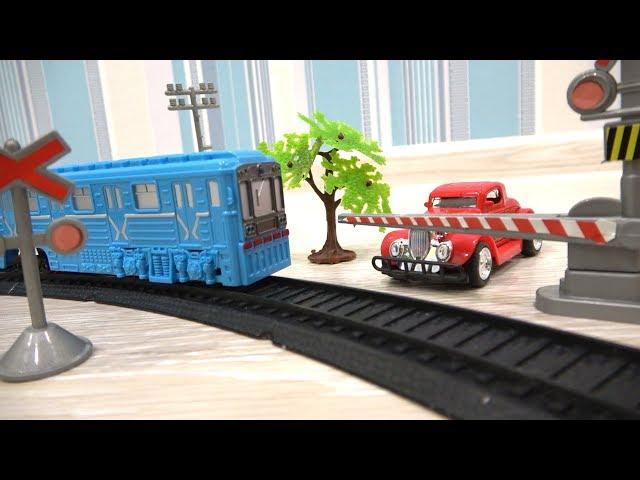 Metro train and the railroad - Playing with cars and trains for children