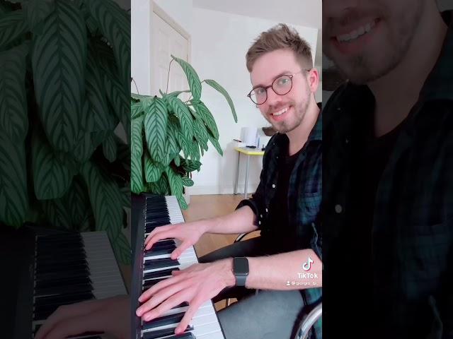 Two neighbours playing piano between a wall - Giorgio and Emil