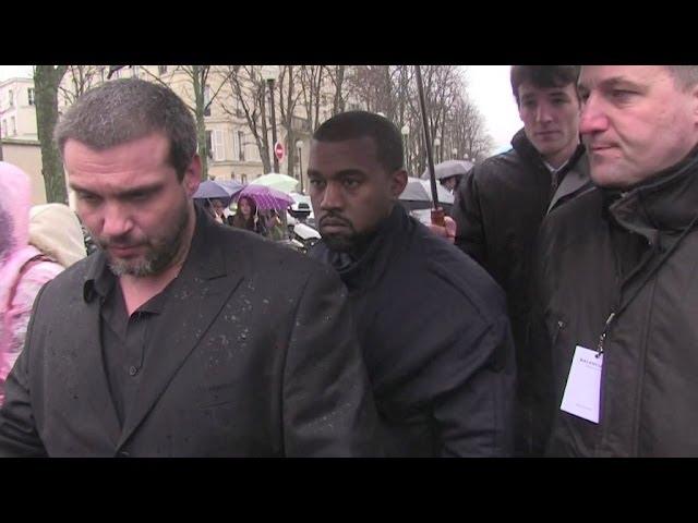 Kanye West attending 2014 Balenciaga fashion show in Paris