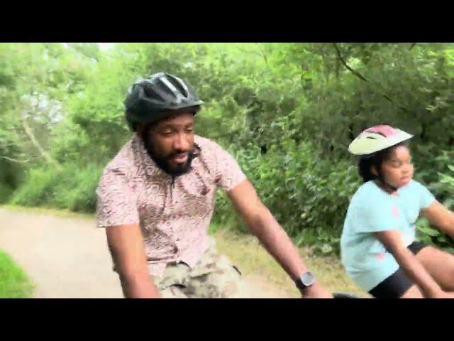 Father And Daughter Cycling