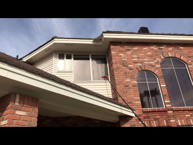 Window Cleaning above a slanted or pitched roof the SAFE way!