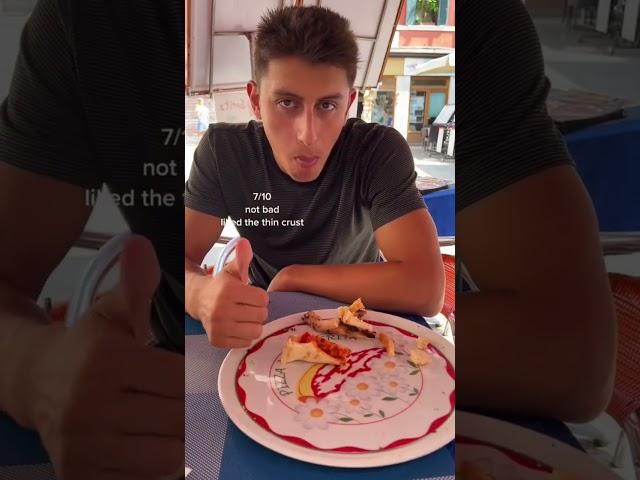 my boyfriend rating pizza in Venice, Italy 