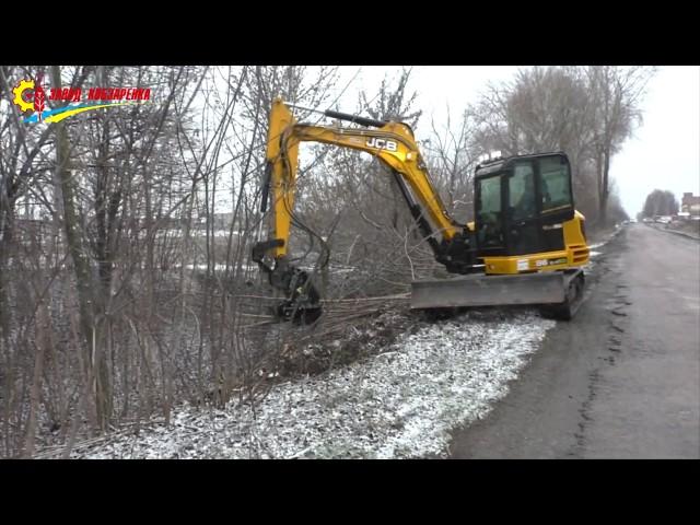 Расчистка лесополос, заросших полей от кустарников и деревьев. Обрезчик ветвей. Ножницы для деревьев