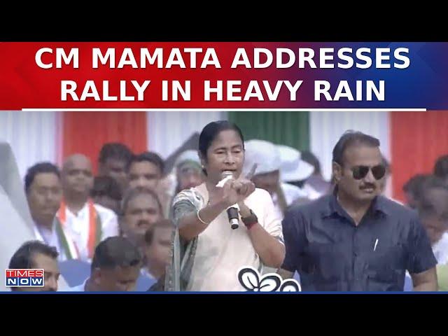 West Bengal CM Mamata Banerjee Addresses Large Gathering During Heavy Rain In Kolkata | English News