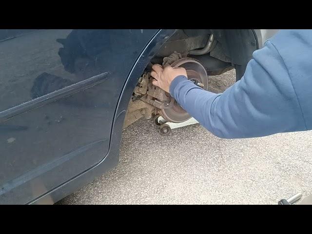 Changing brake pads without the proper tools On a Ford Fusion.