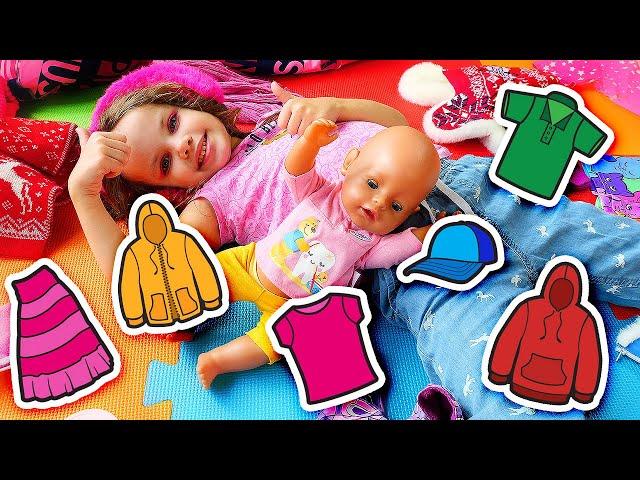 Giochi divertenti con i vestiti per le bambole. Scherzi per bambini. Video per i bambini piccoli