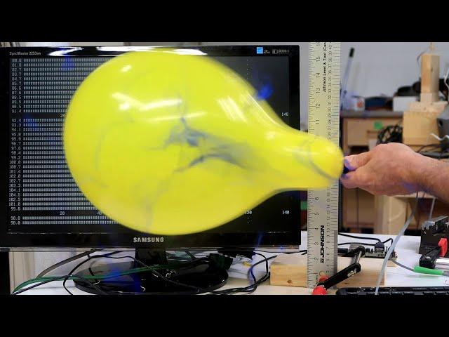 Measuring pressure inside a balloon as it's inflated.