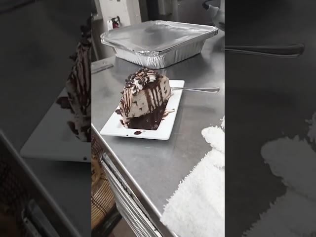 R.L.B: peanut butter cheesecake topped with whipped cream, chocolate syrup, and chocolate chips