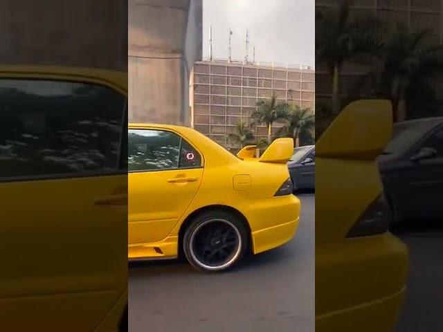 Vibrant and Dynamic: Yellow Mitsubishi Lancer on the Roads of Coimbatore, Tamil Nadu #evolution