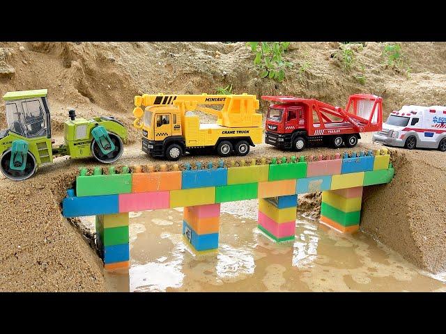 Cranes and road construction vehicles | Find construction vehicles in the sand | BIBO STUDIO