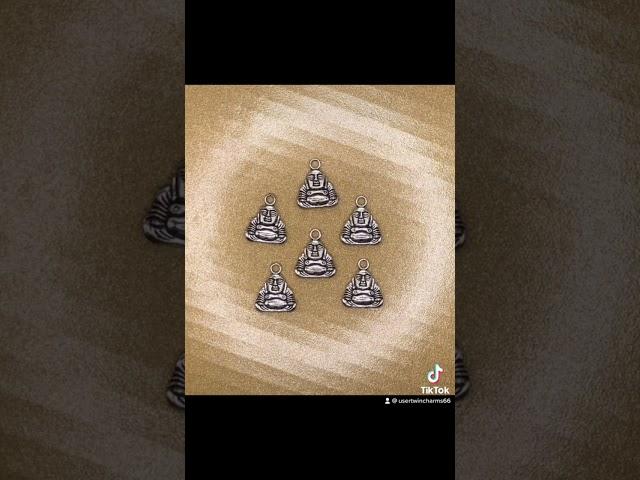 Tibetan silver Buddha charm set of 6. Become awakened with peaceful charms. Shop Twincharms66.com