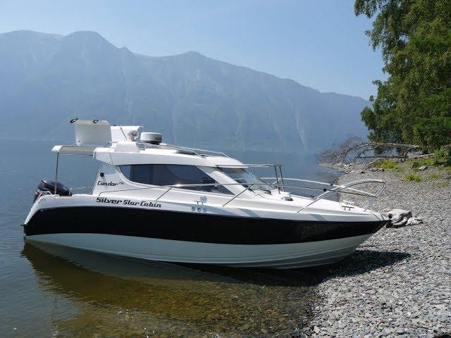 Walk on Lake Teletskoye on a boat with a motor Yamaha 70. Very beautiful views.