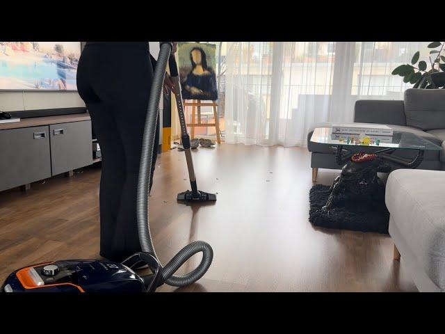 Vacuuming the living room