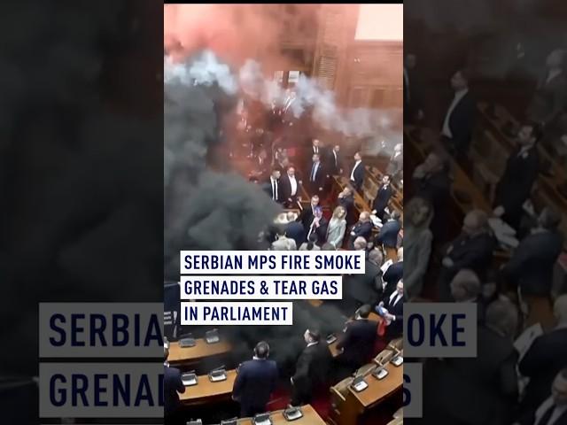 Serbian MPs fire smoke grenades and tear gas in parliament