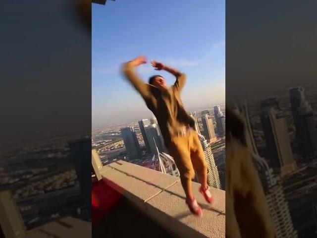 MAN RIDES BIKE ON THE SIDE OF A SKYSCRAPER! | The Proof Is Out There | #Shorts