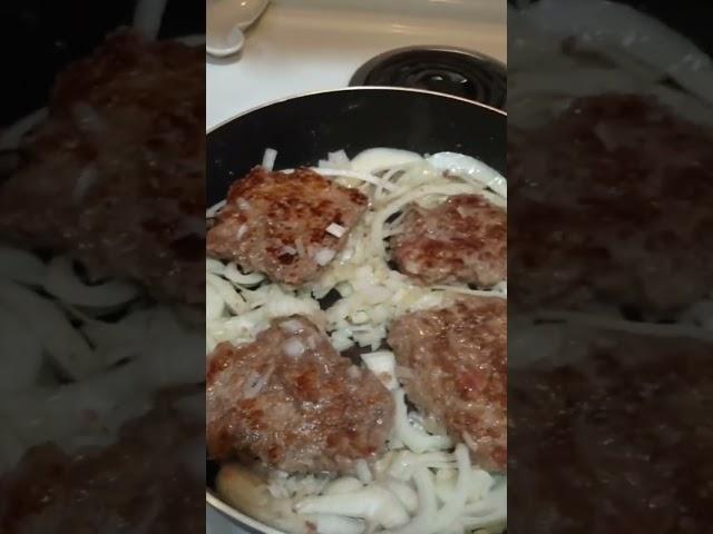 Cubed Steak in Onion Gravy with baby carrots.