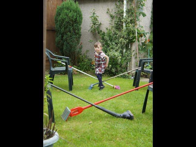 Lexie show jumping in the garden