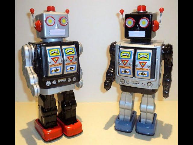 Horikawa type silver and black Rotate O Matic action robots - Space Walk Man