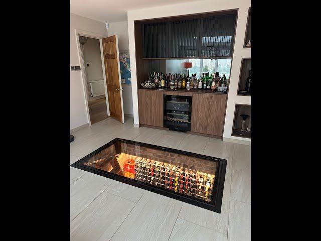 DioMet Electric Hinged Glass Floor /Motorised Wine Cellar Door System.