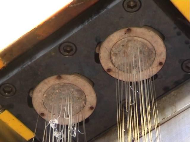 Polymer melt spinning