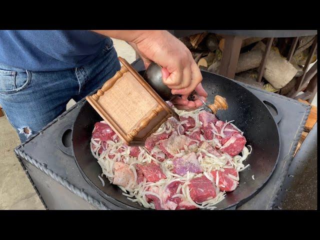 A dish that will conquer everyone, meat in a Kremlin style in a cauldron on the fire