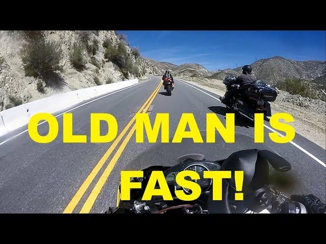 Old Guy on Touring Bike Goes 100+MPH with Crotch Rockets!