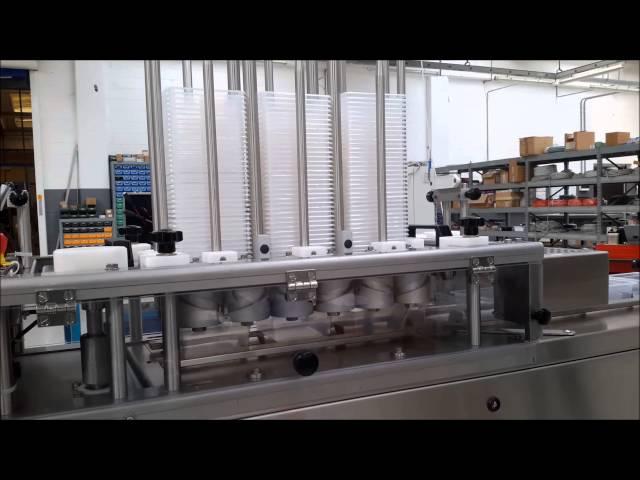 Trays automatic loader with augers - Caricatore vaschette a coclee