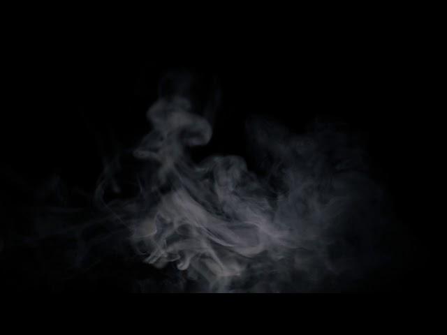 White smoke in a black background. Free HD video footage