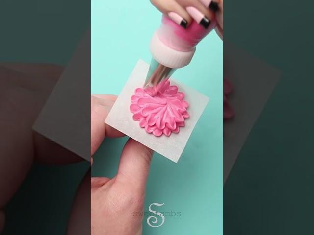 Piping a royal icing flower