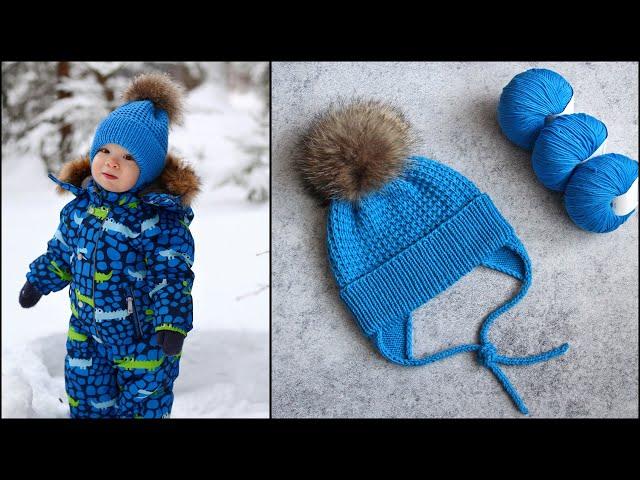 How to knit a baby hat. Children's hat with ears and a fixed lapel. Knitting.