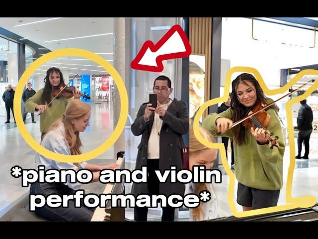 The girl asks me to play Saint-Saëns on the PIANO and a VIOLINIST joins me 