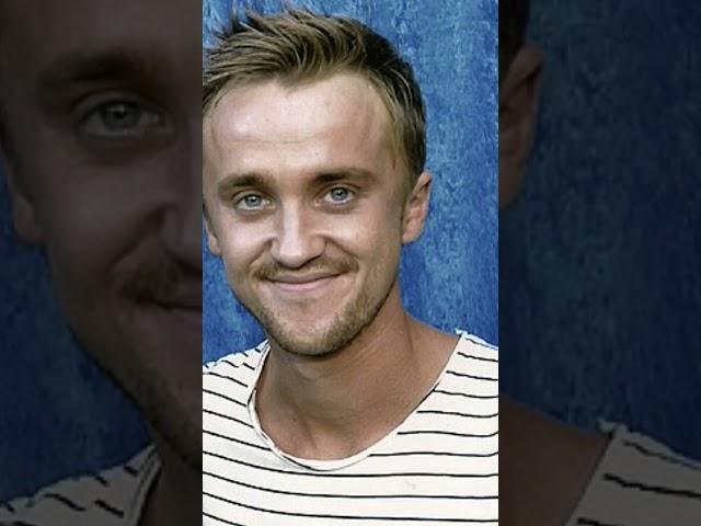 Tom Felton in a suit