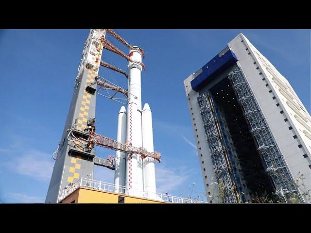 China rolls out rocket for space station supply launch