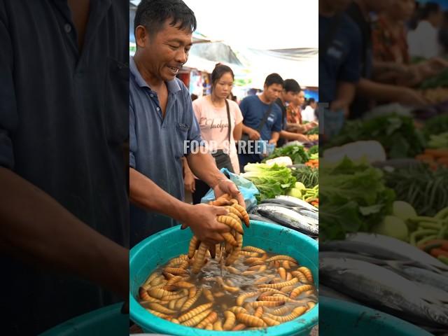 Traditional Market of protein-rich sago worms@muhibbudinfood-ai