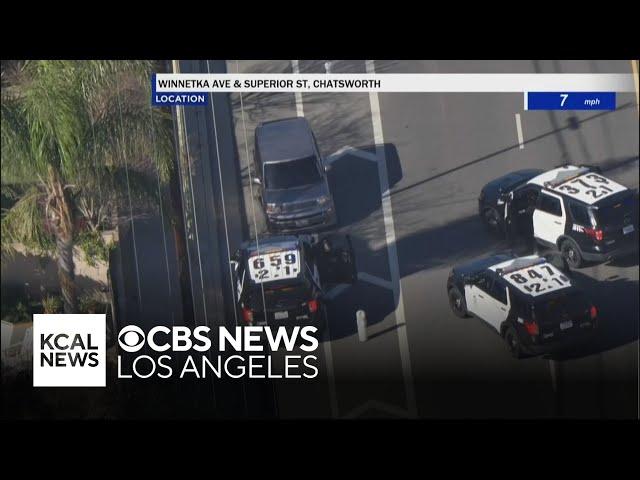 Pursuit suspect drives away from LAPD officers after PIT manuever