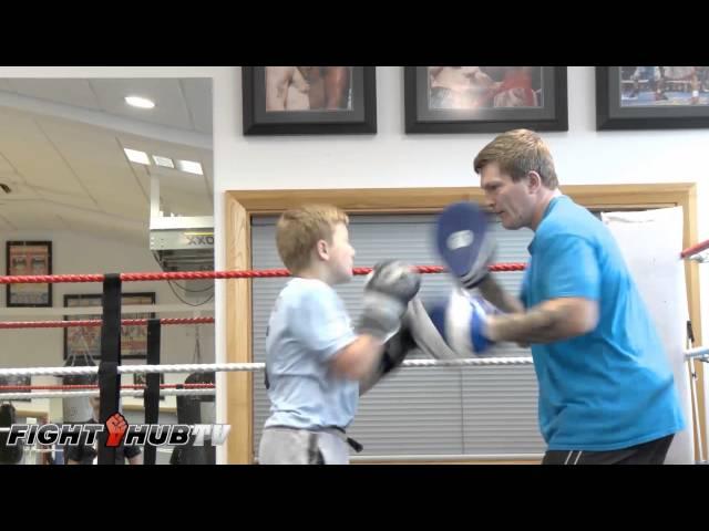 Ricky Hatton's son, shows off body punch combinations as he works the mitts with dad