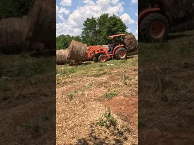 Let’s see how quick we can move this hay! #farmlife #farm #kubota #kubotatractor #tractor #hay
