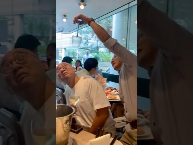 Watch this gentleman executes the #WineFlipChallenge by holding it upside down over someone's head!