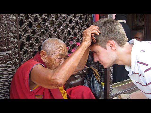 Blessed by female Buddhist monk in Nepal