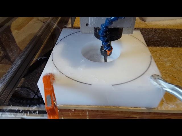 CNC router cutting 3-1/2" HDPE plastic