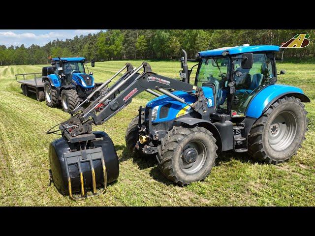 Grasernte 2023 gewickelte Rundballen verladen New Holland Traktoren & Presse - Futter für Milchkühe