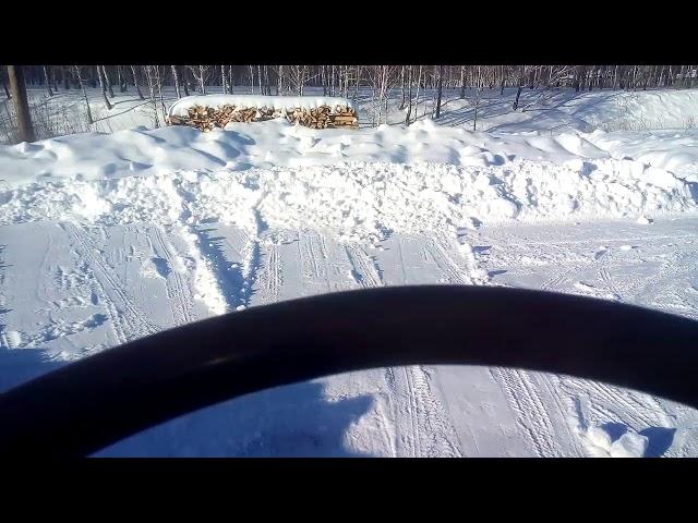 чиска снега на мини трактаре