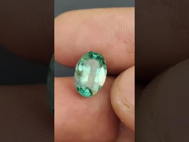 Multifaceted Zambian emerald green gemstone natural