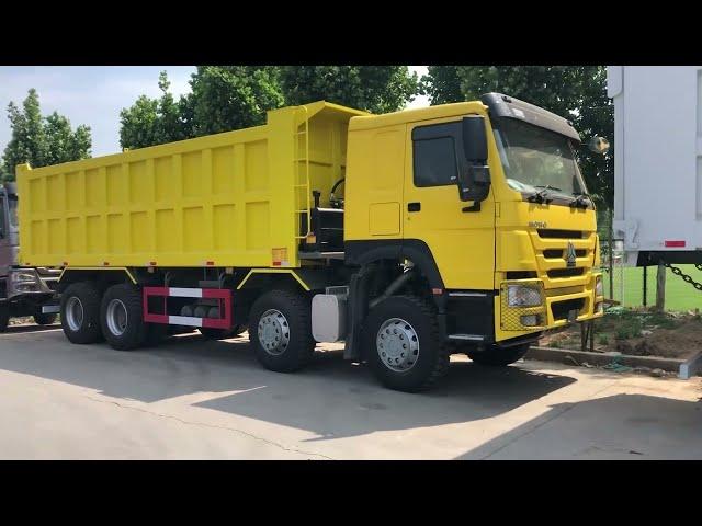 Sinotruk Zimbabwe Howo 8x4 tipper truck 400hp 60 tons price