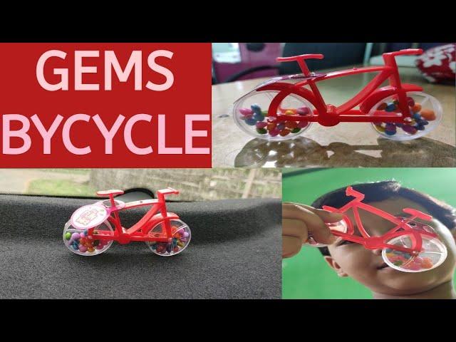 GEMS Bycycle | Red Bycycle with Gems | Drishti's Weblog