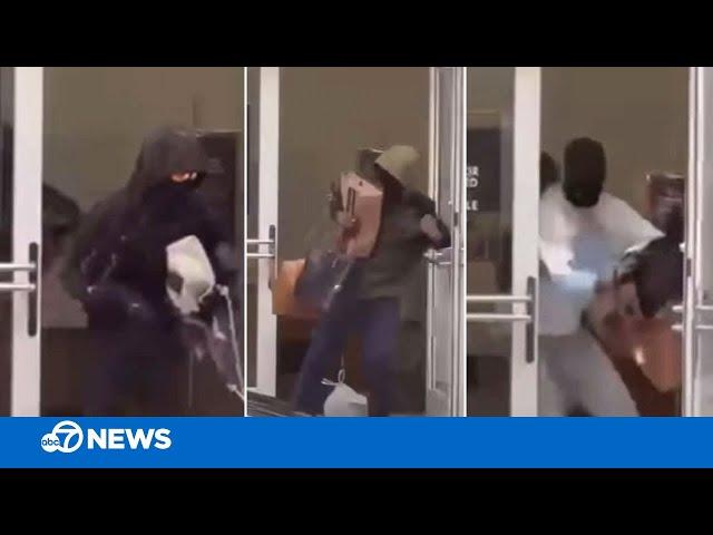 Video shows suspected thieves sprinting out of California Neiman Marcus with designer handbags